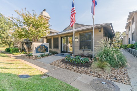 a house with an american flag in front of it