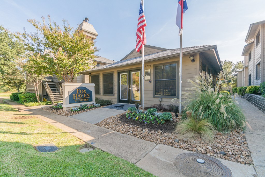 a house with an american flag in front of it