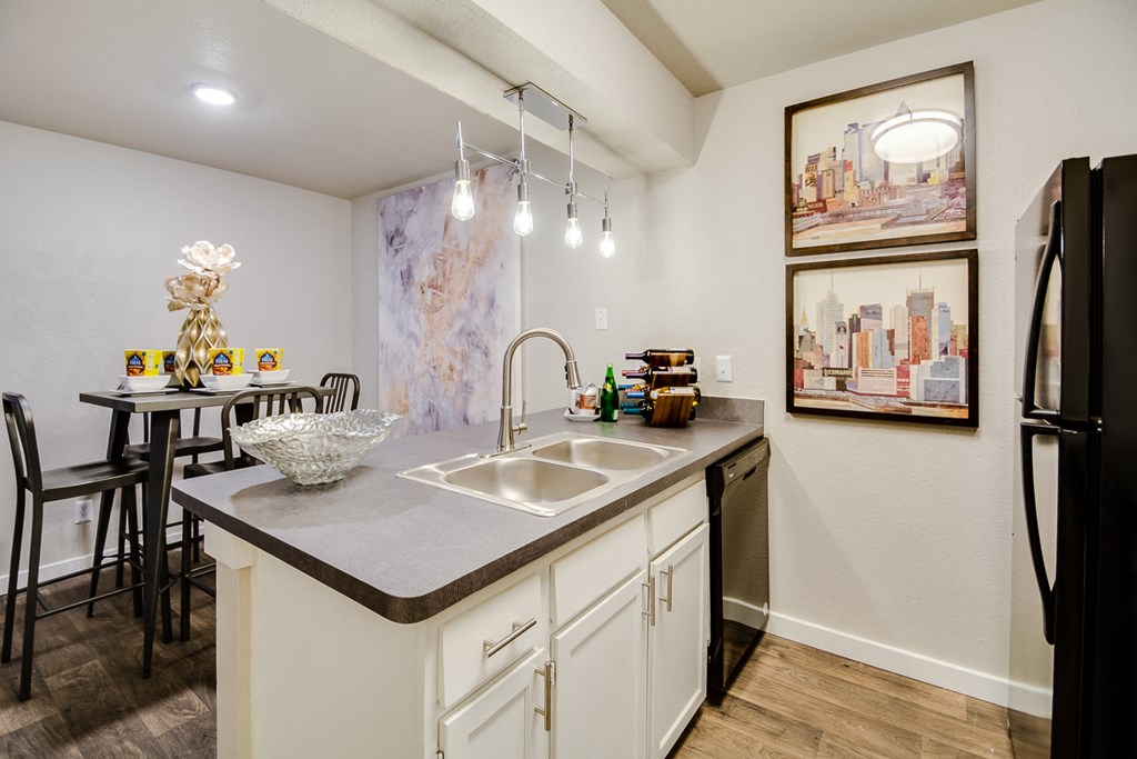 our 2400 2400 2400 kitchen and dining area with a table and chairs and a refrigerator
