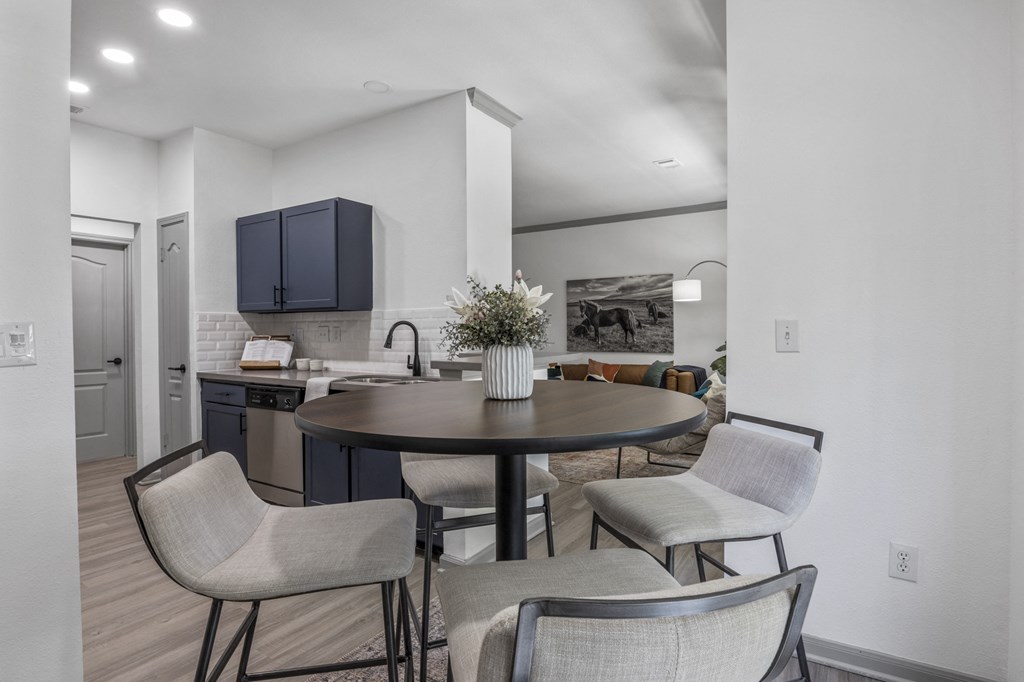Dining Room With Kitchen at Villas at Rogers Ranch, San Antonio