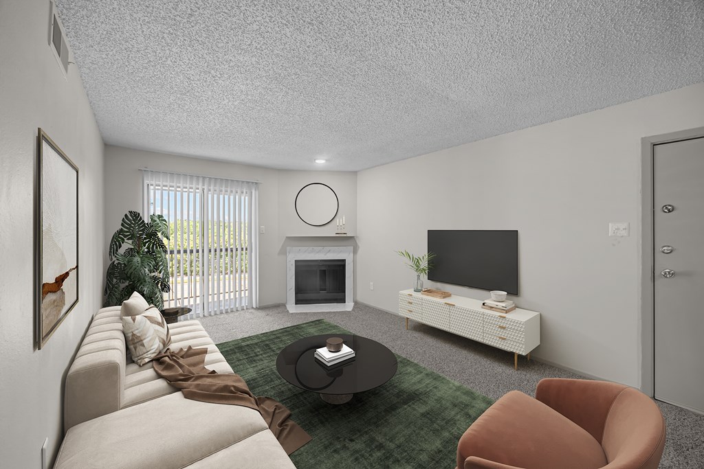 A living room with a couch, a coffee table, a television, and a plant.