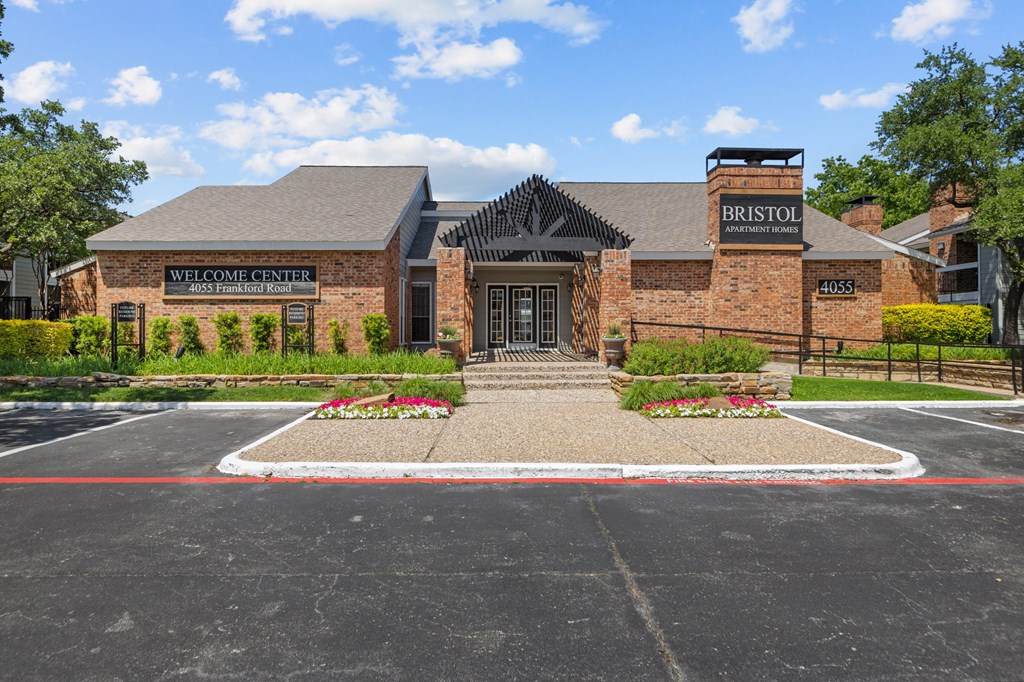 A building with a black roof and a sign that says "Bristol" on it.