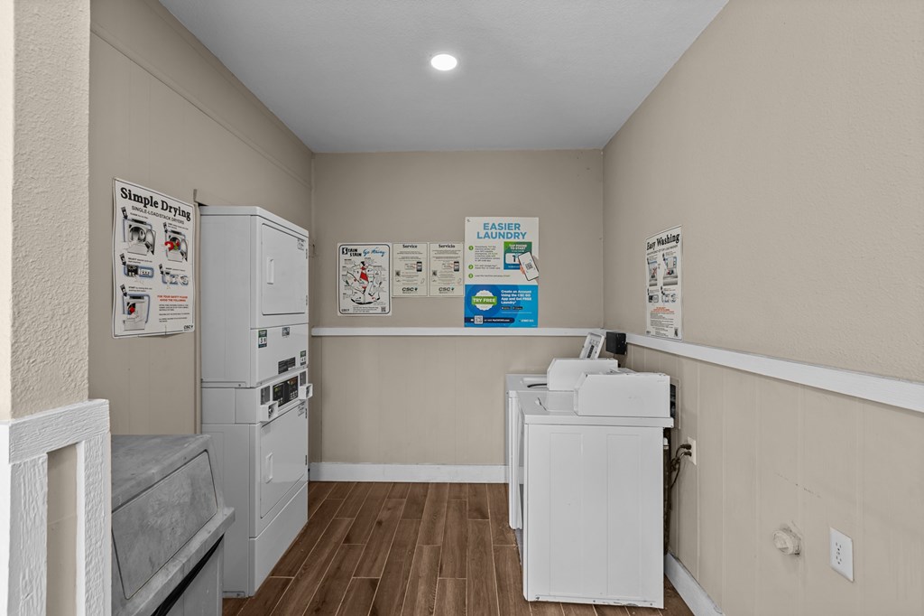 A laundry room with a washer and dryer.