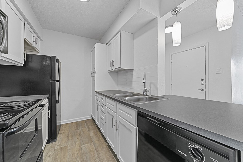 a kitchen with white cabinetry at Vesper, Dallas, TX, 75254