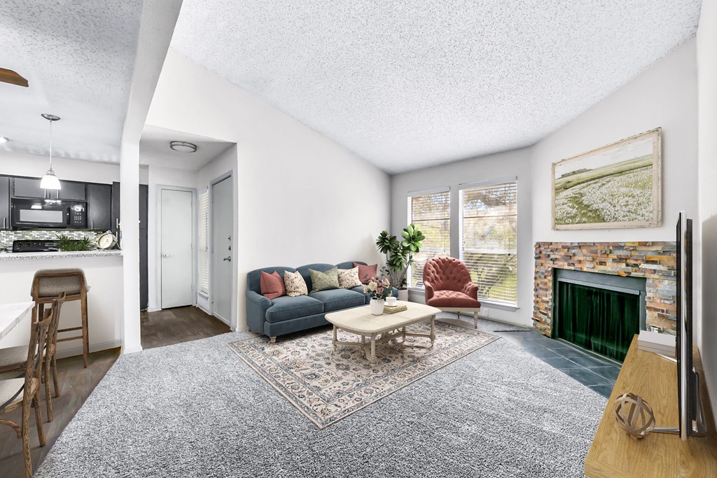 our apartments offer a living room with a fireplace  at Vesper, Dallas