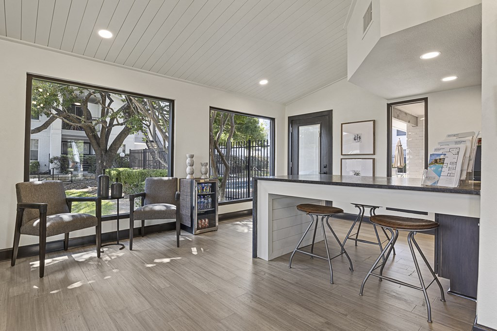 A modern interior with a bar area and seating. at Tradewinds, Windcrest