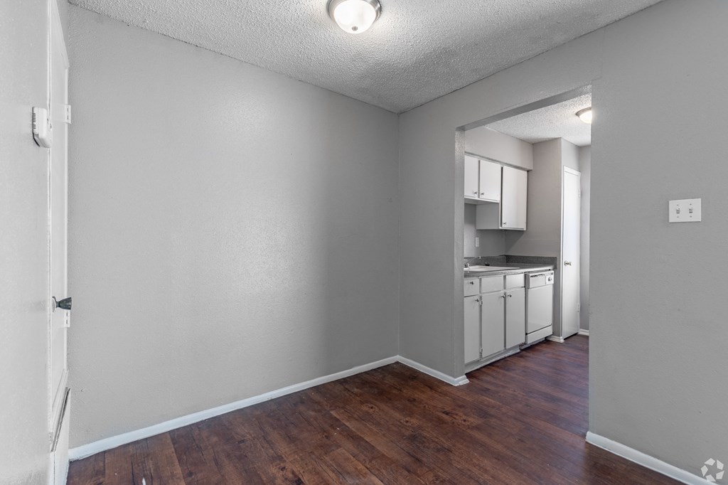 a living room and kitchen of an apartment at The Frederick, San Antonio Texas