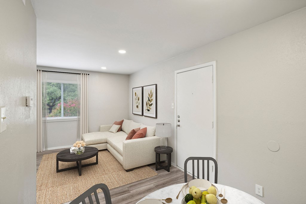 a living room with a couch and a table