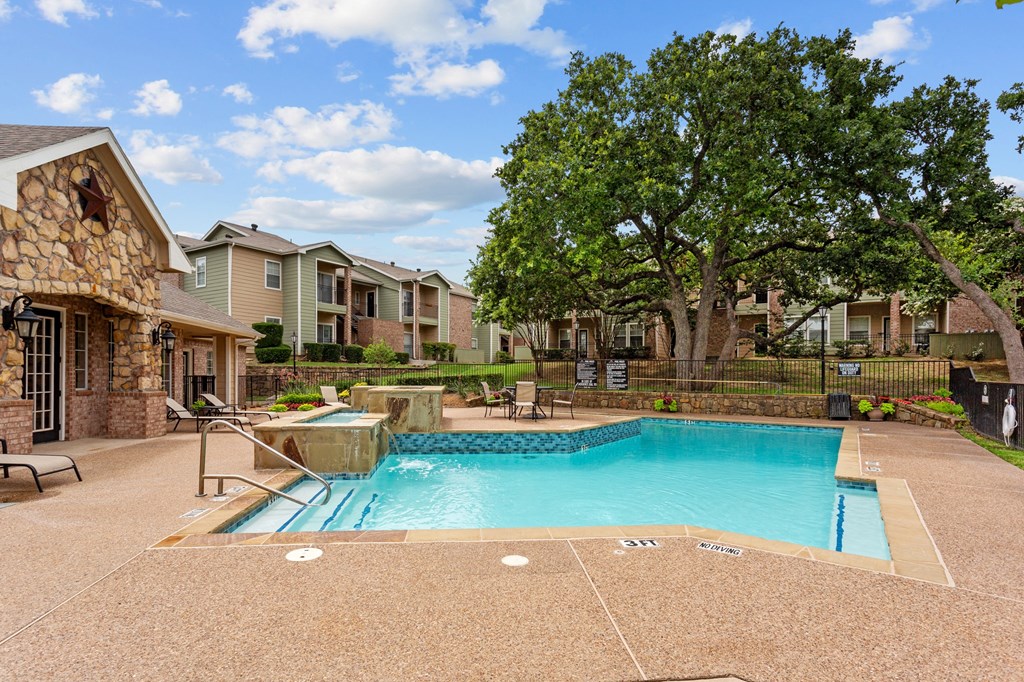 Southgate Glen pool and amenities with apartment buildings at Southgate Glen, Weatherford