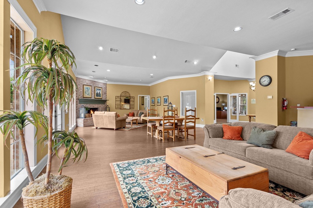 a living room with couches and tables and chairs at Southgate Glen, Weatherford, Texas
