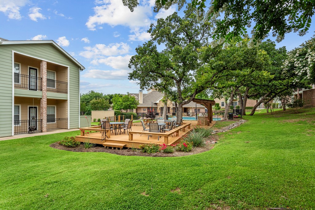Southgate Glen pavilion with trees and a wooden deck at Southgate Glen, Weatherford, TX, 76086