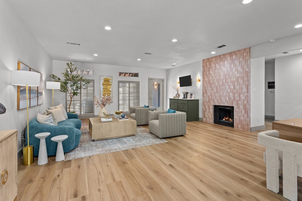A living room with a fireplace and a couch.