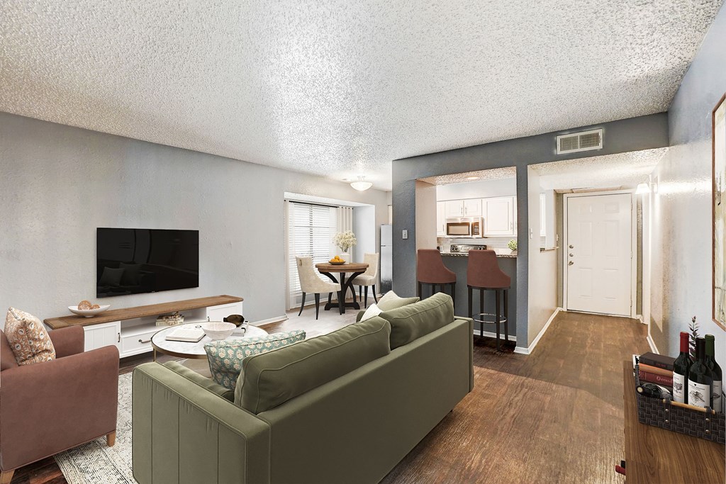 a living room with a couch and a tv