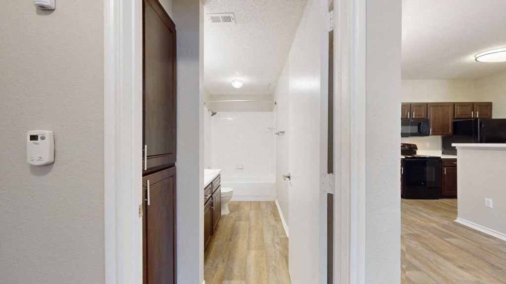 a view of a kitchen and living room from a doorway at Southgate Glen, Weatherford, TX, 76086