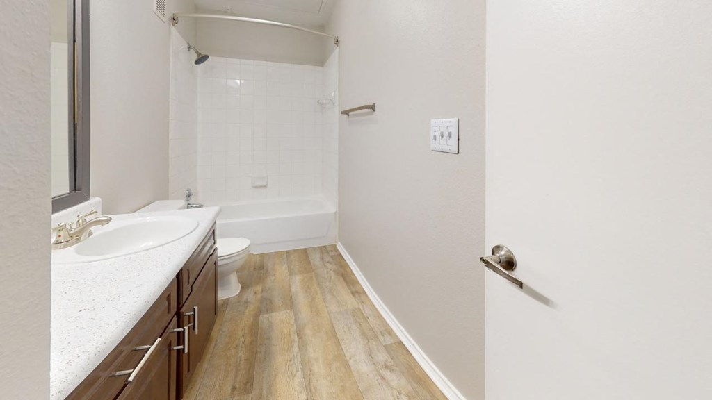 a bathroom with a sink and a toilet at Southgate Glen, Weatherford, TX