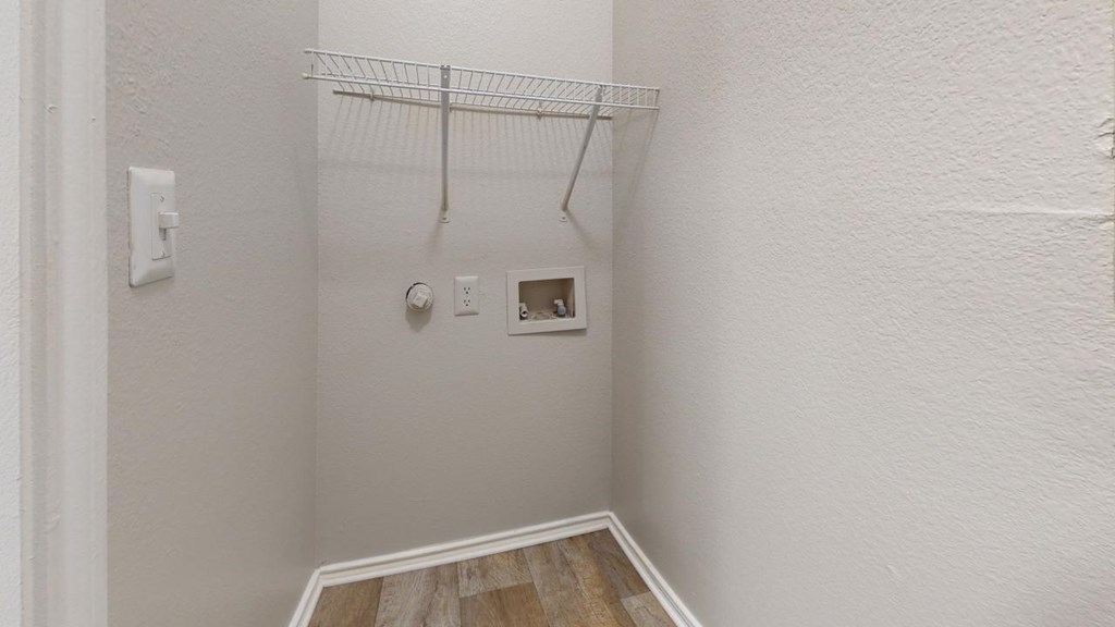 a small bathroom with a shower and a rack on the wall at Southgate Glen, Weatherford, Texas