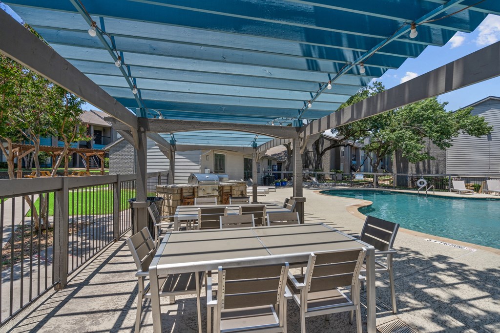 take a dip in the pool at villas at houston levee west apartments in cord  at Vesper, Dallas