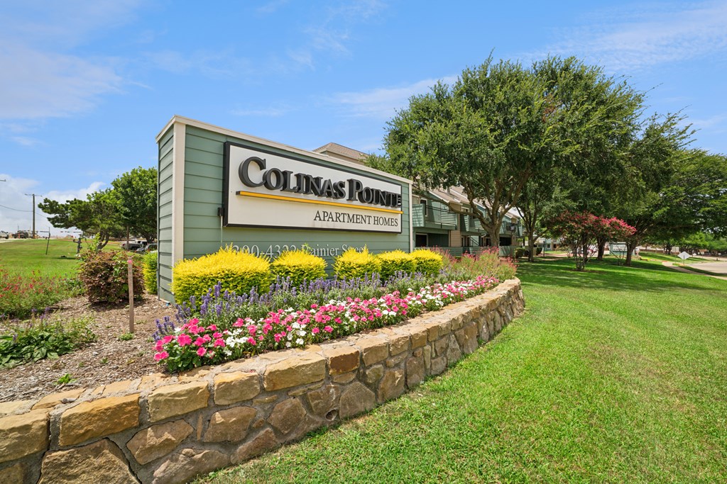 A sign for Colin's Runes Apartment Home is shown.