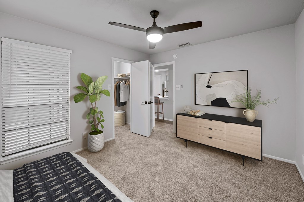 our apartments offer a bedroom with a king sized bed  at Carmel at Deerfield, San Antonio, TX