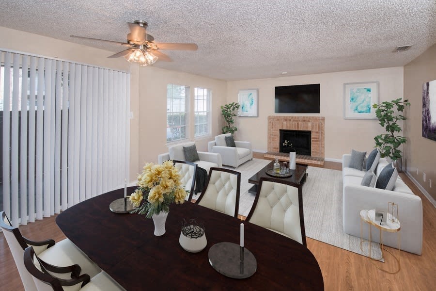 a living room and dining room with a table and chairs at Tradewinds, Windcrest, Texas