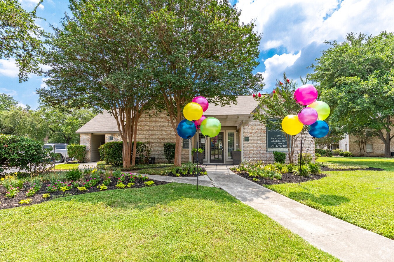 a house with balloons in front of it