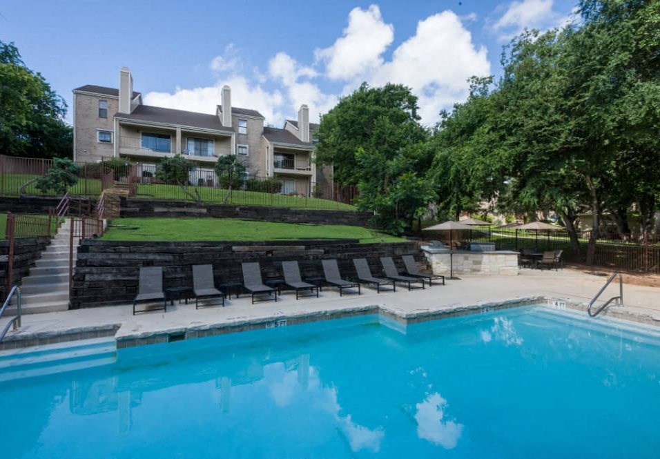 One of our Two Pools with an Outdoor Grilling Center at Maxwell Townhomes, Texas