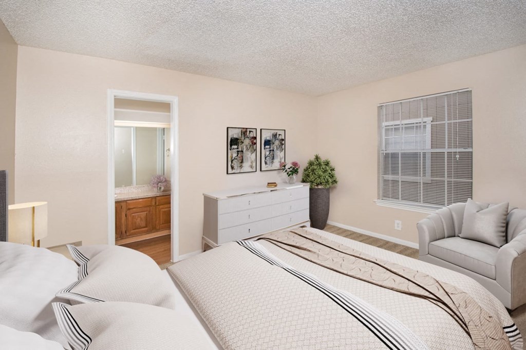 a bedroom with a bed and a dresser and a window at Tradewinds, Windcrest, TX, 78239