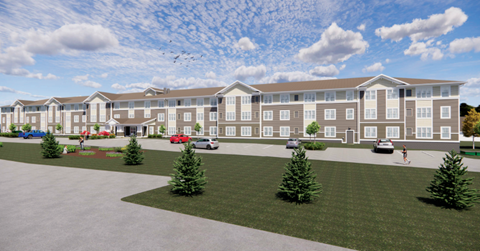 A large building with a parking lot in front of it.