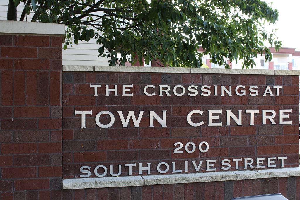 A sign for The Crossings at Town Centre on South Olive Street.