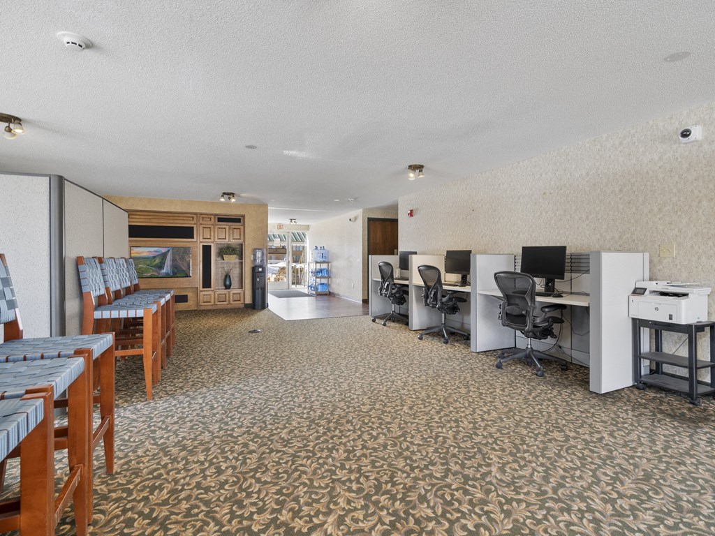 1st Story Clubhouse with computers and chairs