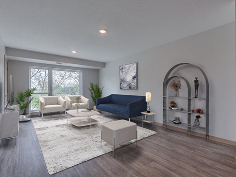 a living room with white walls and a blue couch