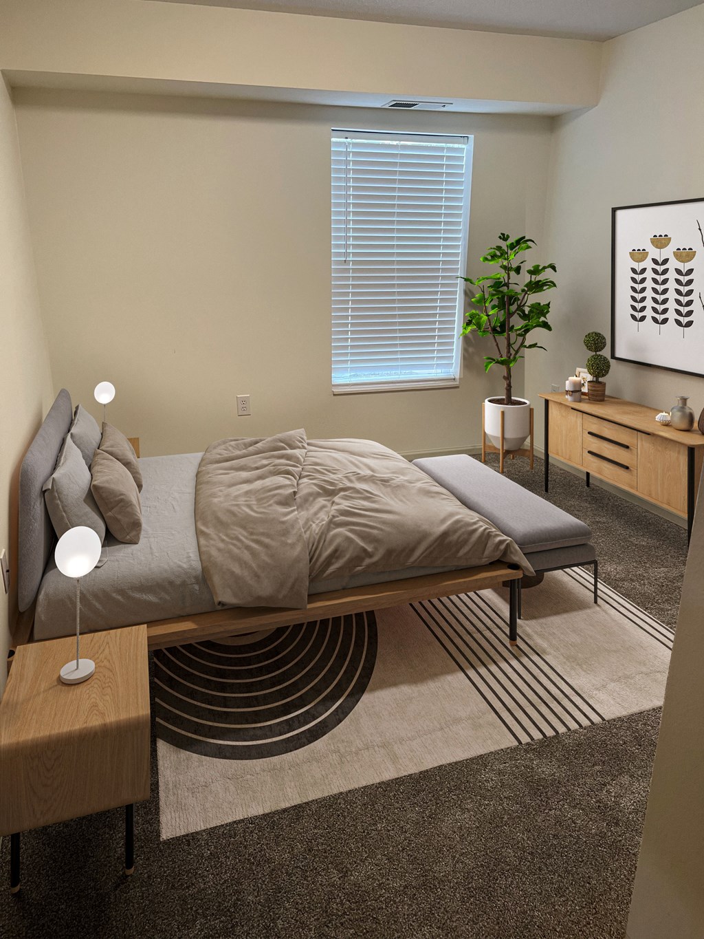 a bedroom with a bed and dresser in a 555 waverly unit