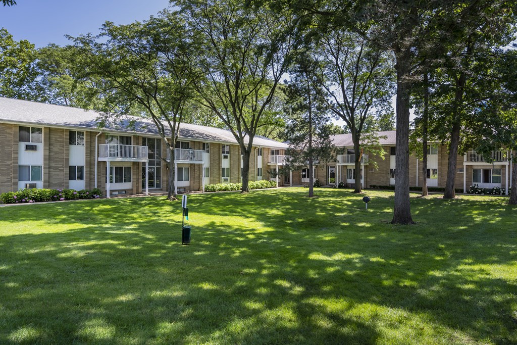 our apartments are located in a quiet area with grass and trees