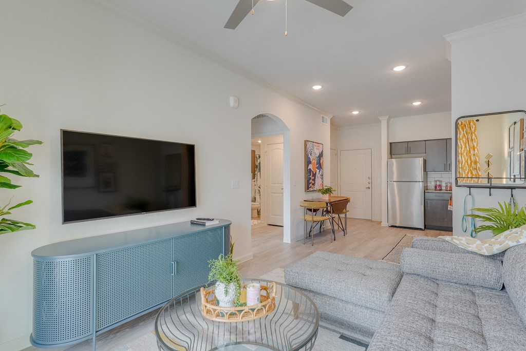 a living room with a couch and a television