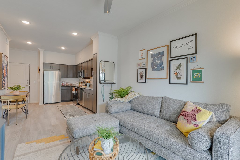 a living room with a couch and a table