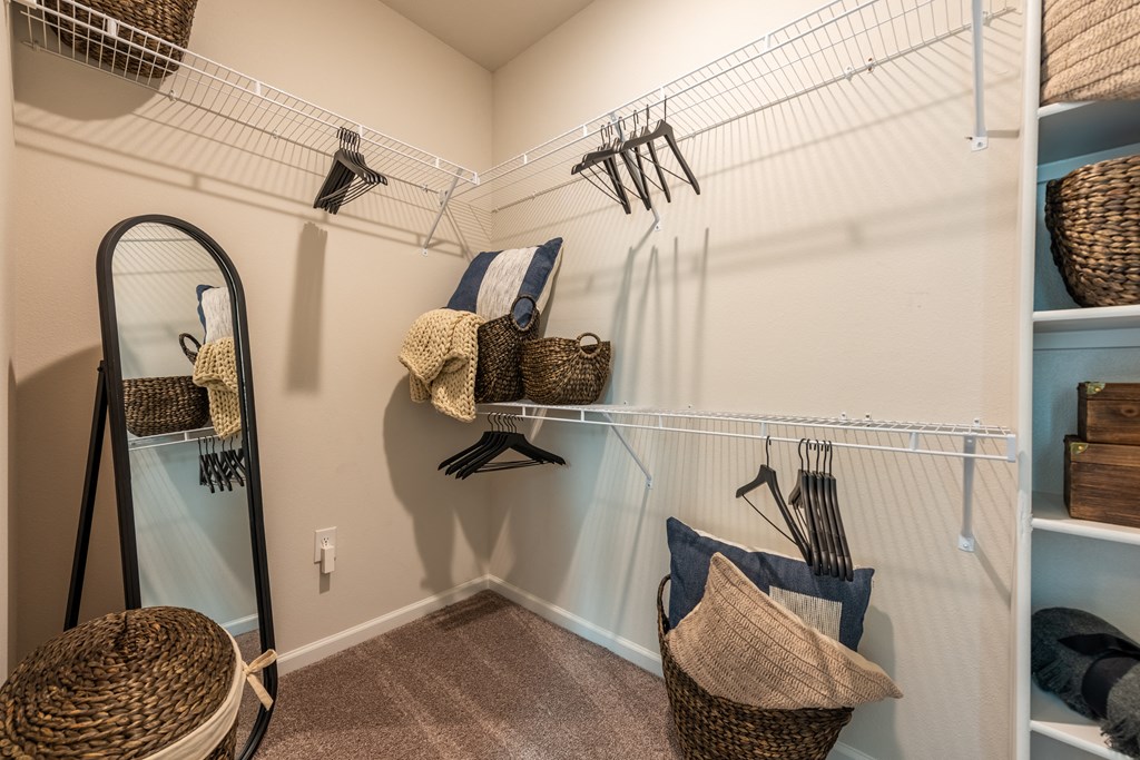 Walk in closet of a spacious luxury apartment at Bridge at Paloma 78754 Northeast Austin