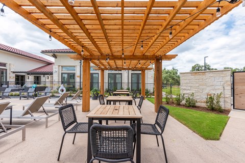 the patio at the bradley braddock road station apartments at Avery Ranch, Texas, 78717