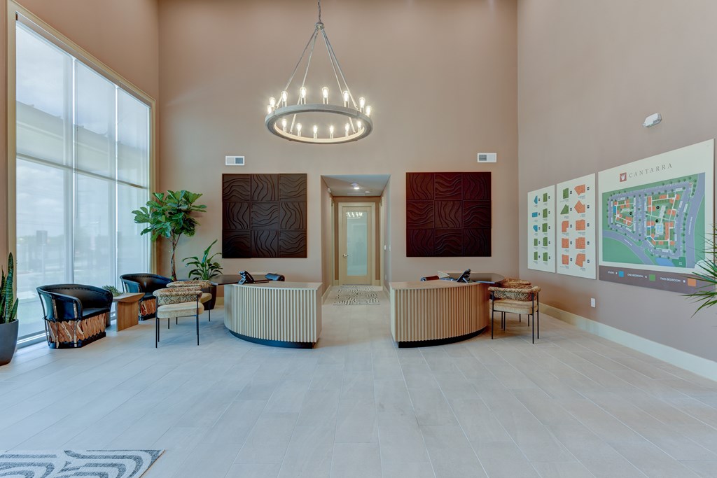A large room with a reception desk and a map on the wall.