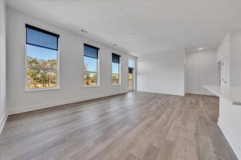 the living room and dining room are spacious and clean at Luxe 360 in Midlothian, Virginia