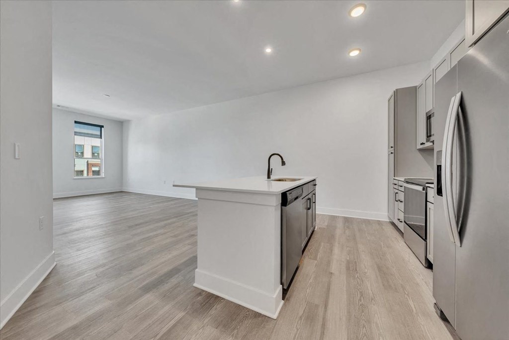 a kitchen with an island in the middle of it at Luxe 360 in Midlothian, Midlothian, 23114