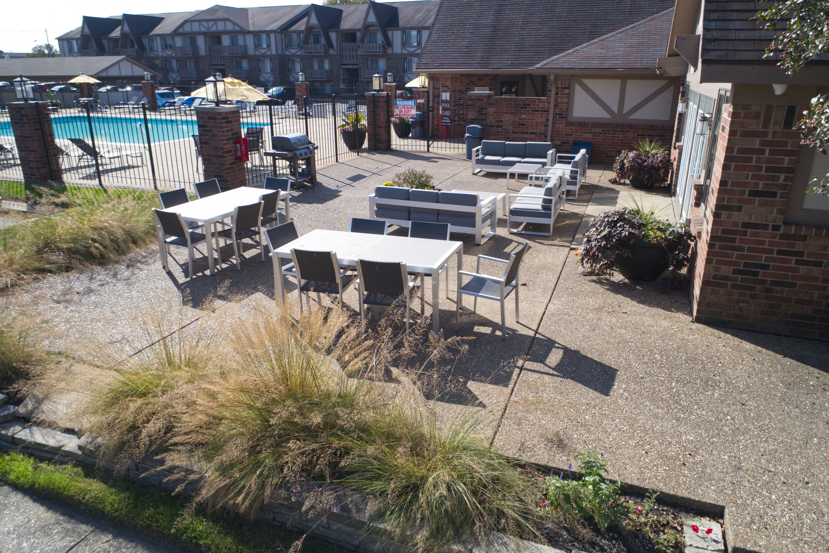Poolside Patio Seating at The Timbers Apartments, Evansville, IN
