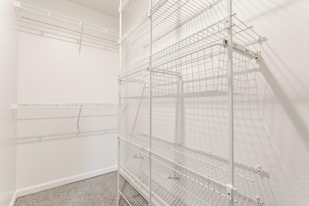 Empty white shelving unit in a room at Huntington Cove Apartments, Merrillville, IN, 46410