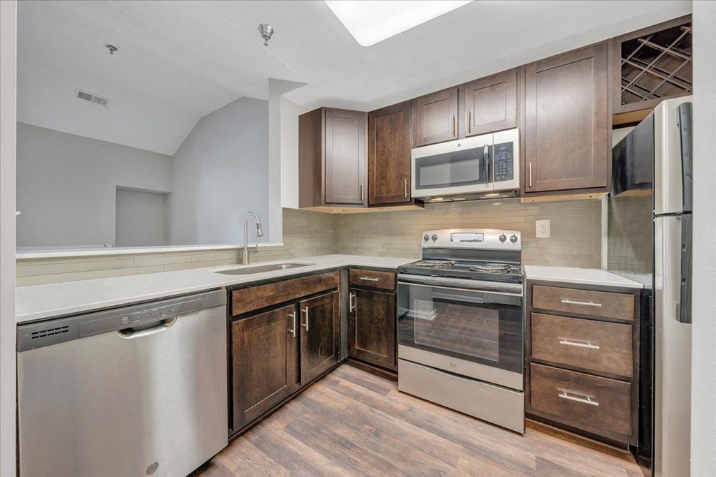 Espresso Cabinetry Collection with White Quartz Finishes  at Trophy Club at Bellgrade, Virginia