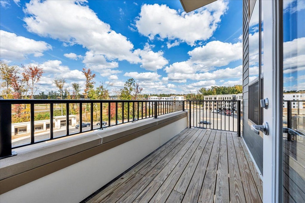 the balcony has a view of the city and the sky at Luxe 360 in Midlothian, Midlothian, VA