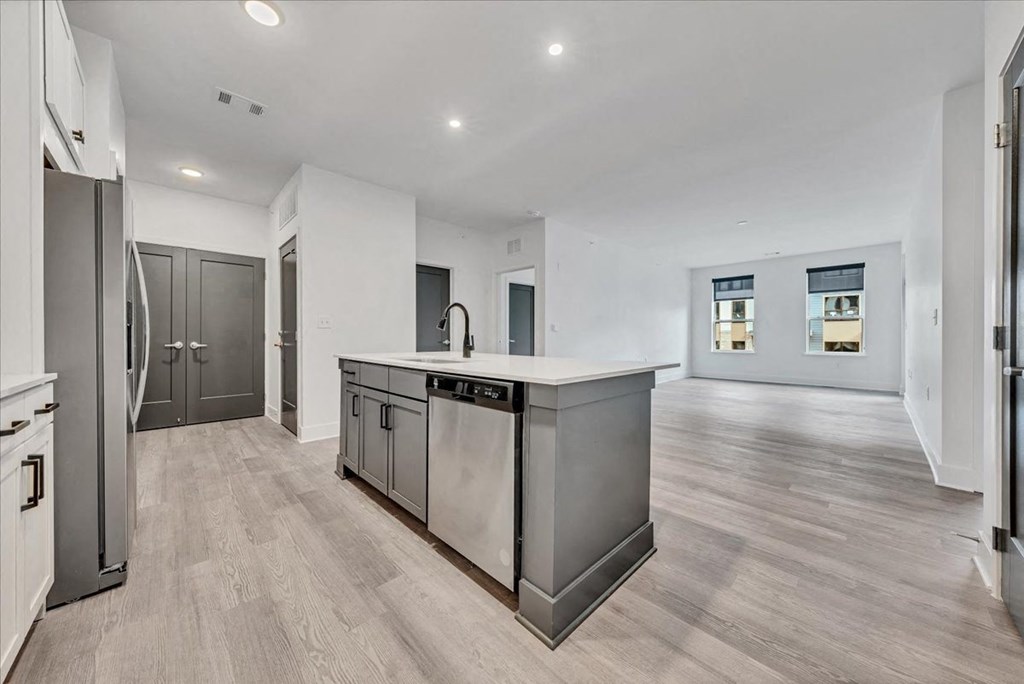 a kitchen with a large island in the middle of it at Luxe 360 in Midlothian, Midlothian, VA