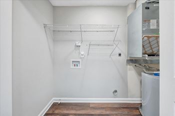 a laundry room with a washer and dryer  at Trophy Club at Bellgrade, Midlothian