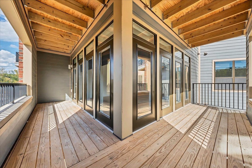 the home has a large deck overlooking the water at Luxe 360 on Centerpointe Apartments, Midlothian