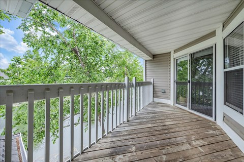the deck has a view of the trees and the water at Trophy Club at Bellgrade, Midlothian, VA, 23113