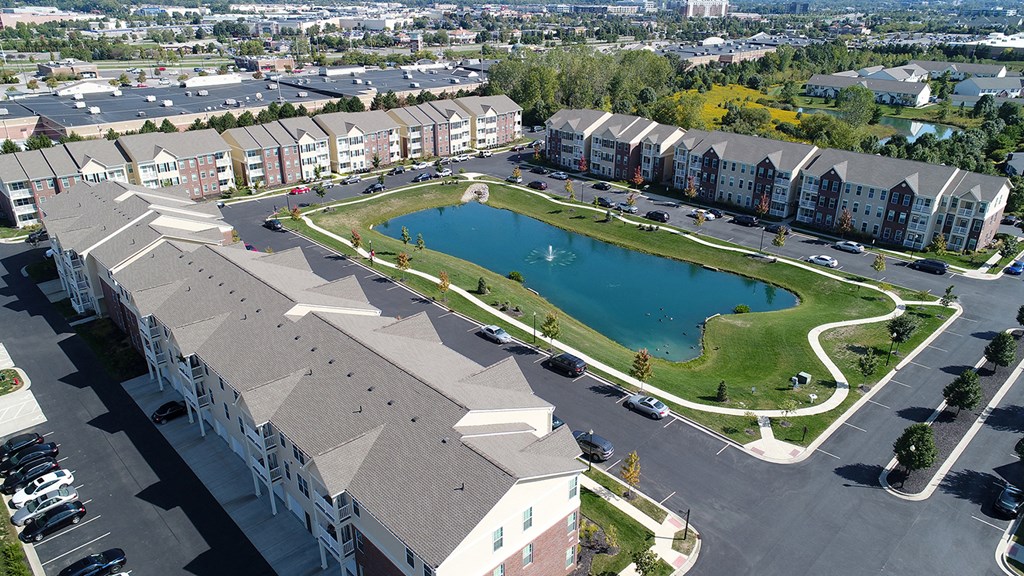 Aerial view of lake with walking trail