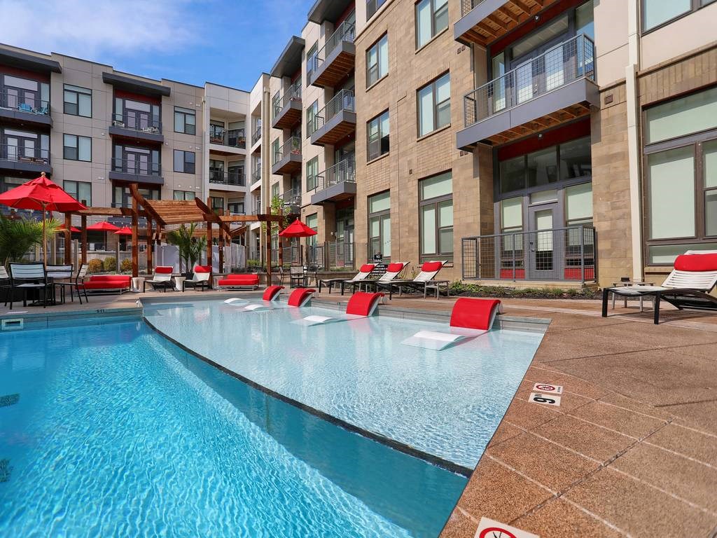 a pool with lounge chairs at Avant & Avant II, Carmel, IN